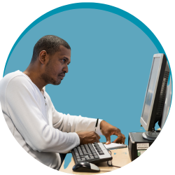 Person sat working at a computer